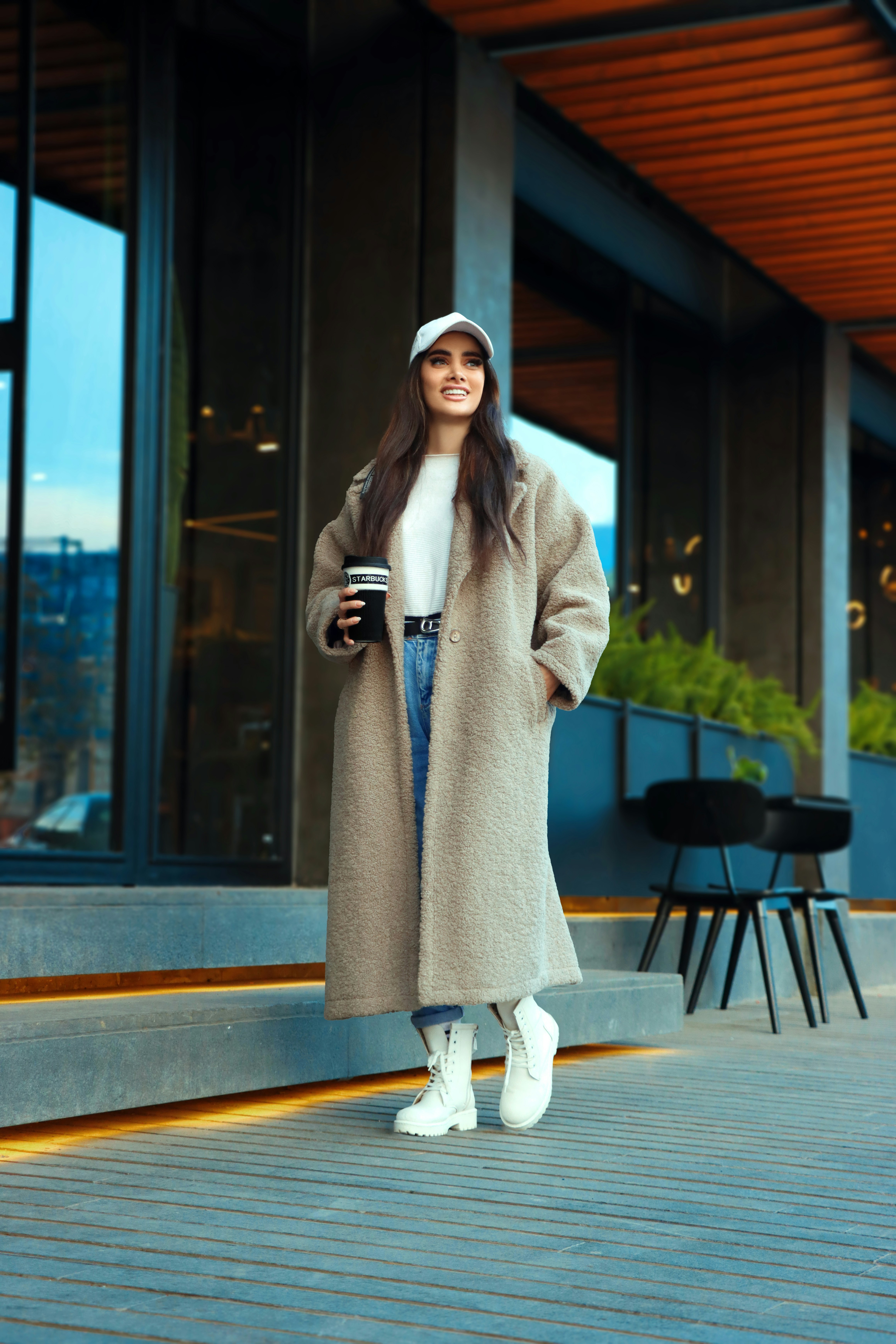 a person in a long coat