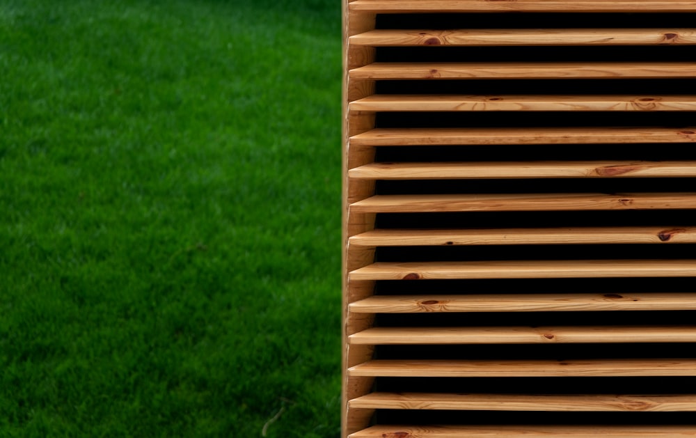 a wooden deck on grass