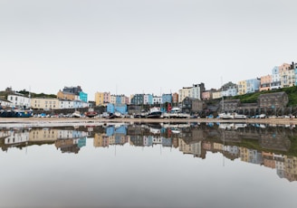 a body of water with buildings along it