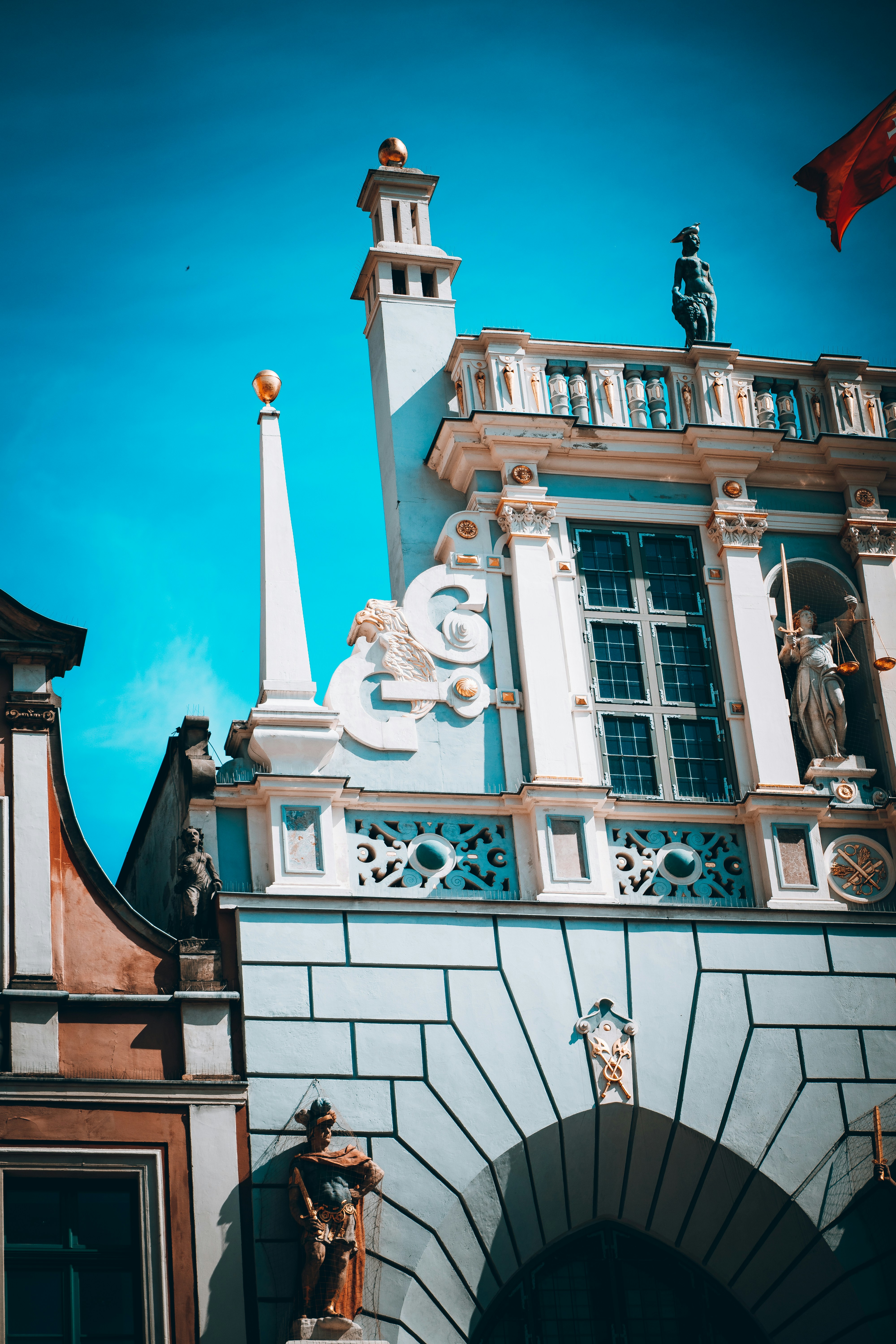 a building with statues on the outside