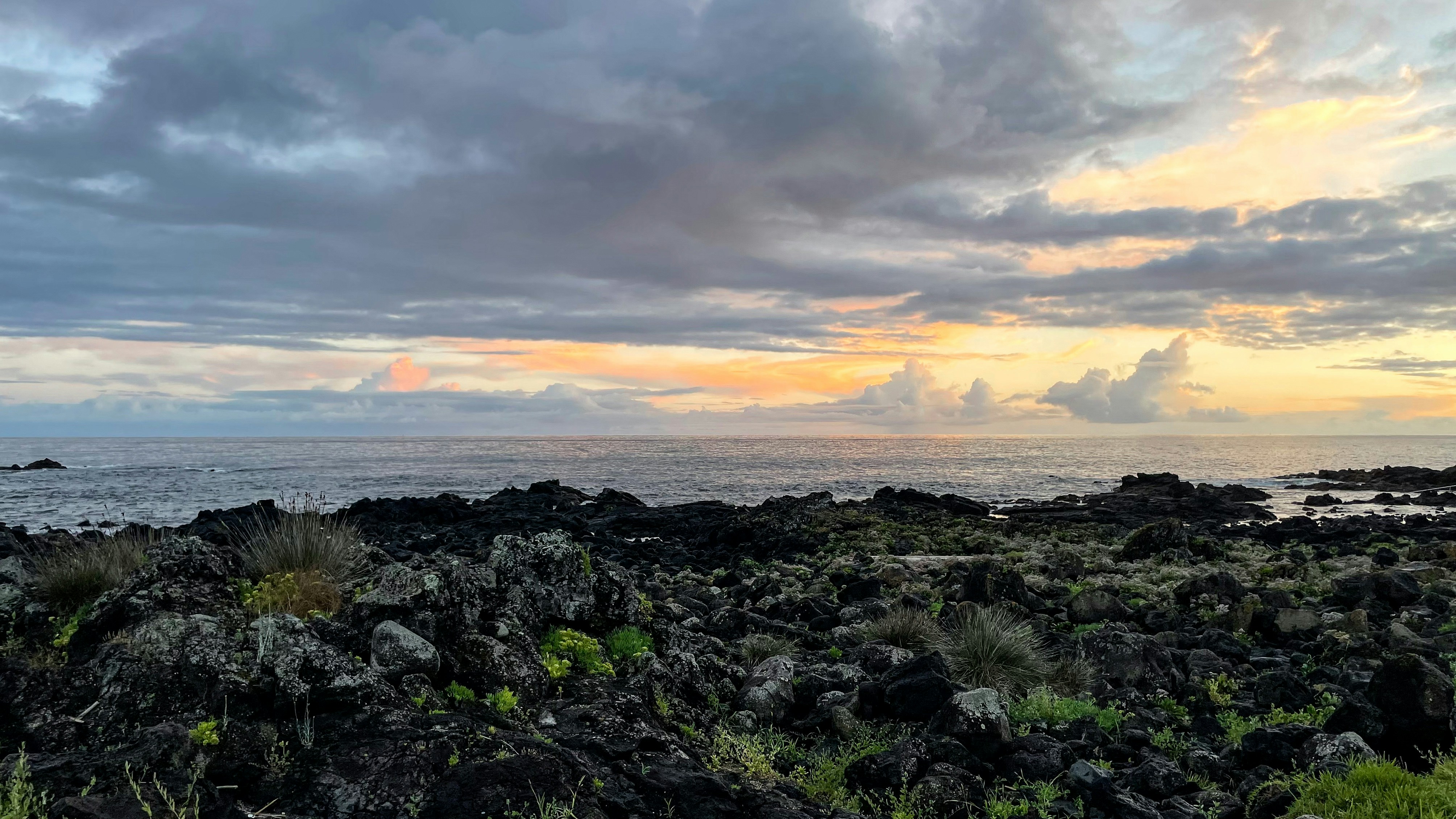 Rocky beach with cloudy sky