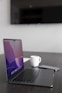 a laptop and a cup of coffee