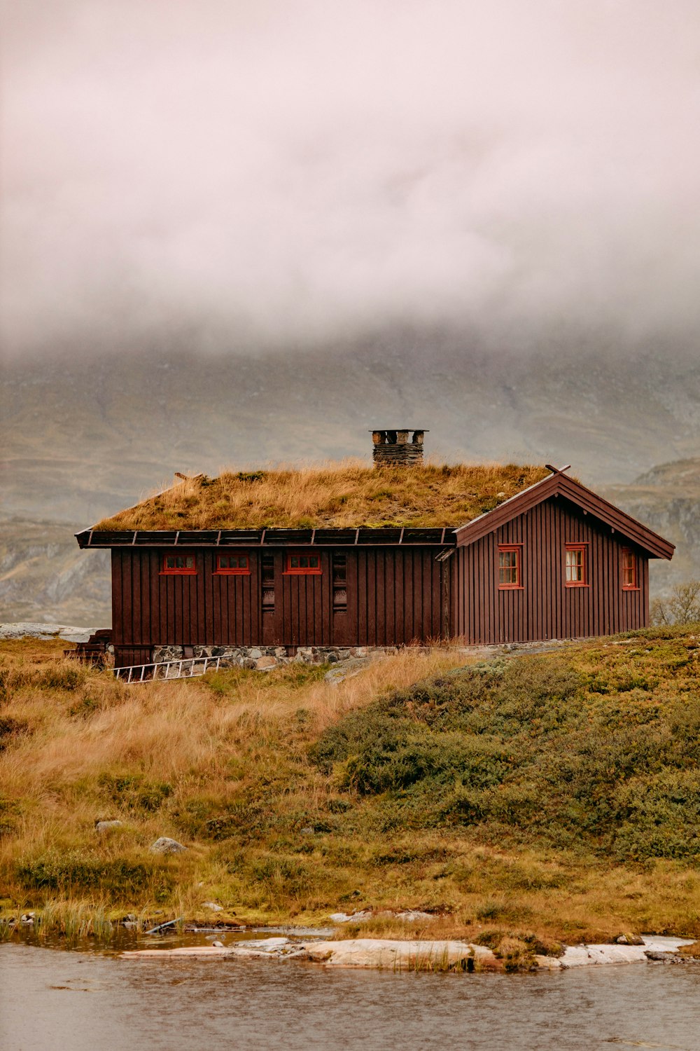 a barn on a hill