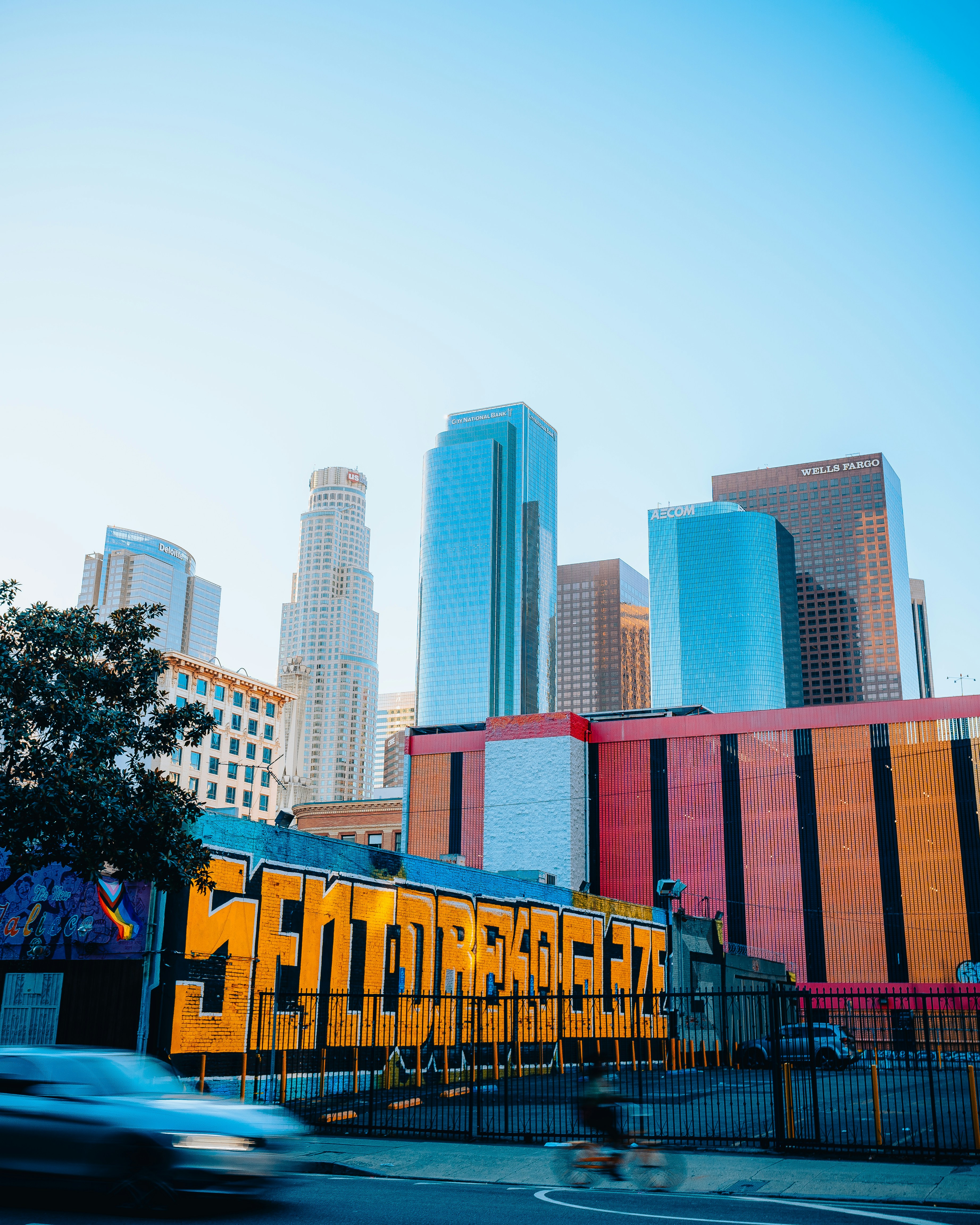 a city skyline with a train