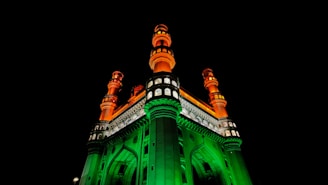 a green and red building