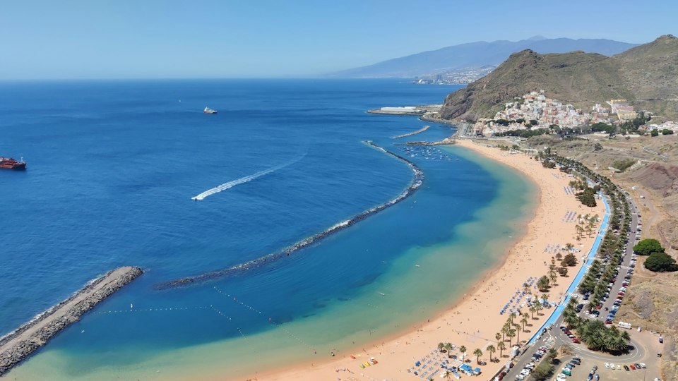 Aerial view of the crescent-shaped golden sand of Playa de las Teresitas near Santa Cruz de Tenerife