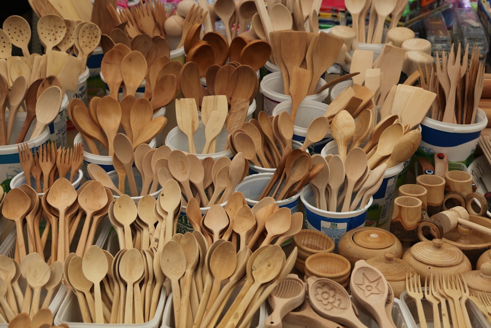 a large group of clay pots