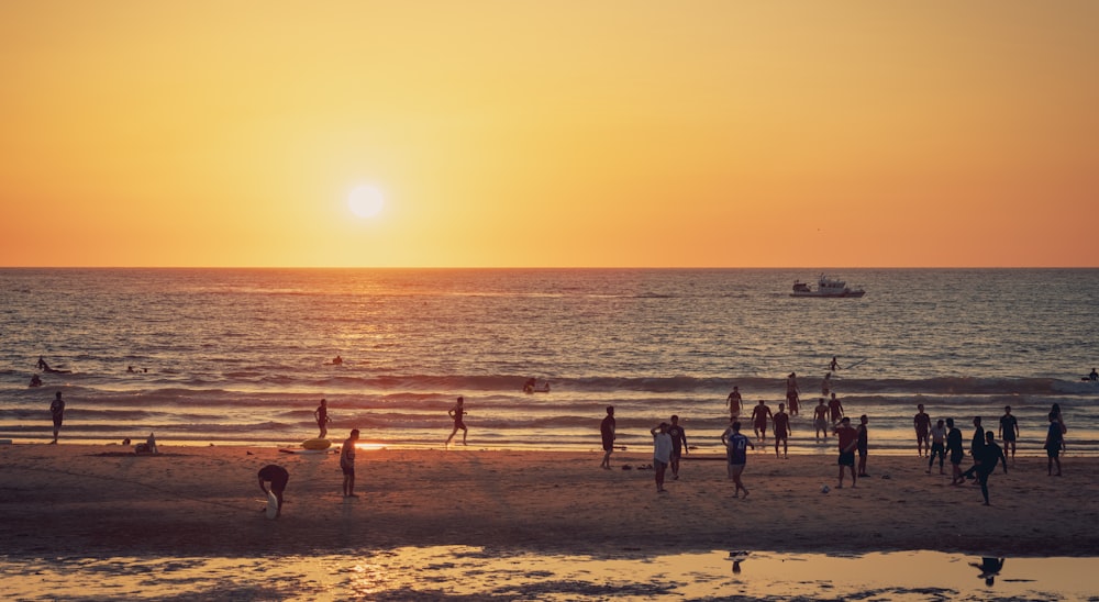 a group of people on a beach