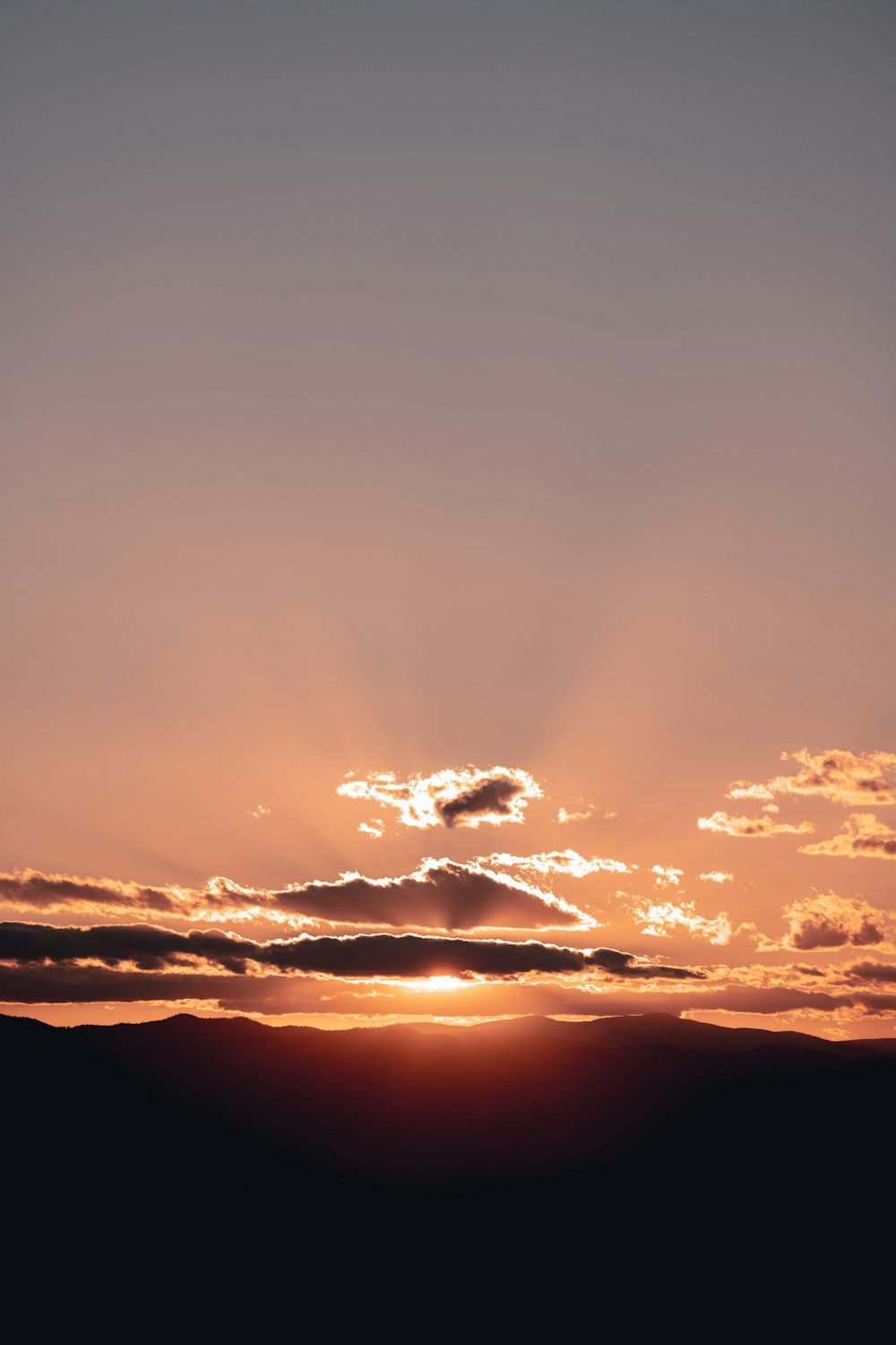 a sunset with clouds