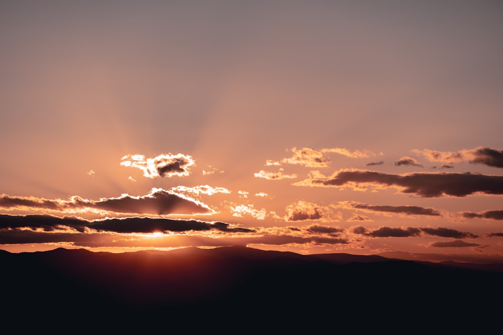 a sunset with clouds