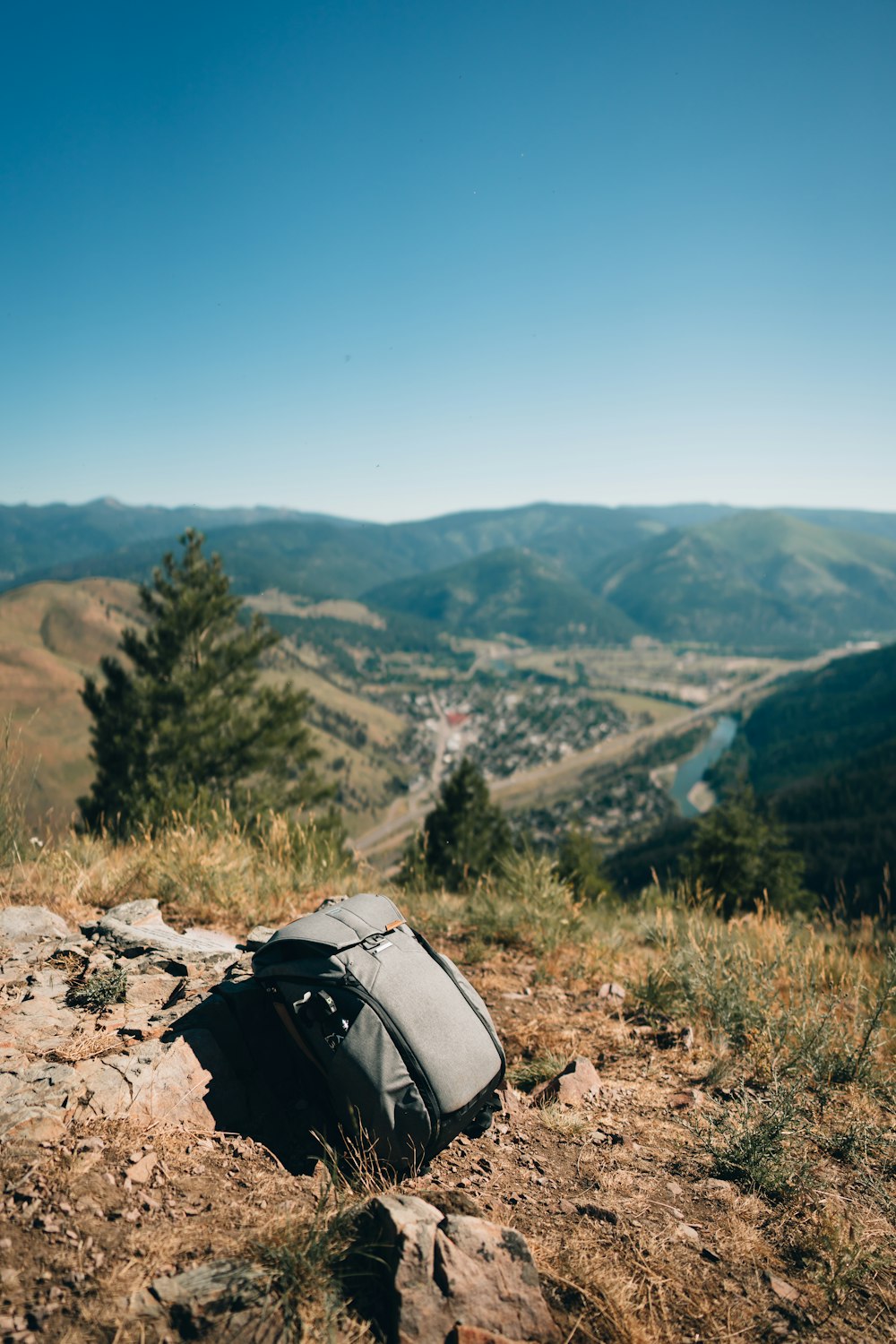 a tent on a rocky hill