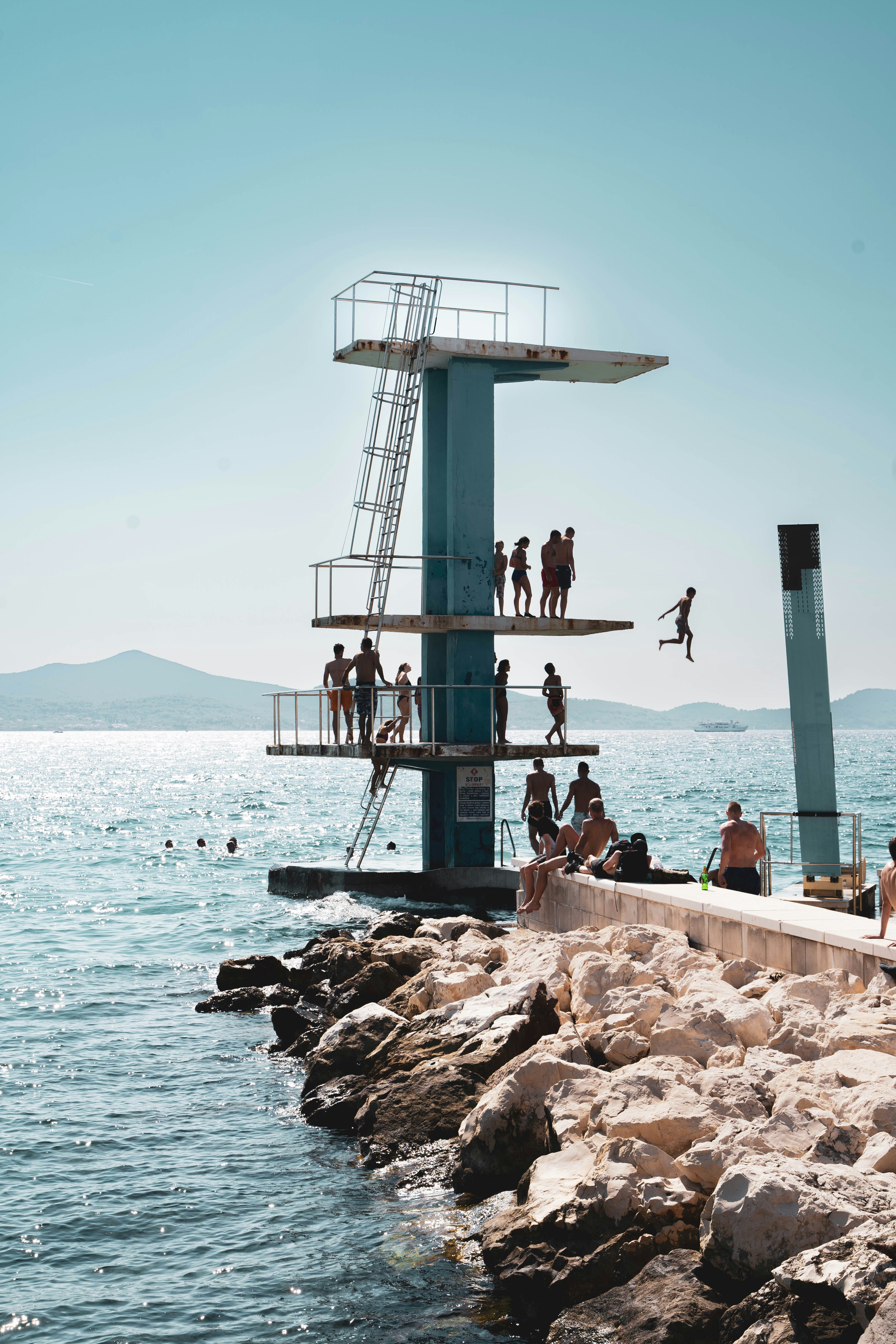 a group of people on a dock