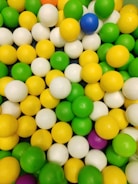 Stack of colorful rubber balls ready for shipment.