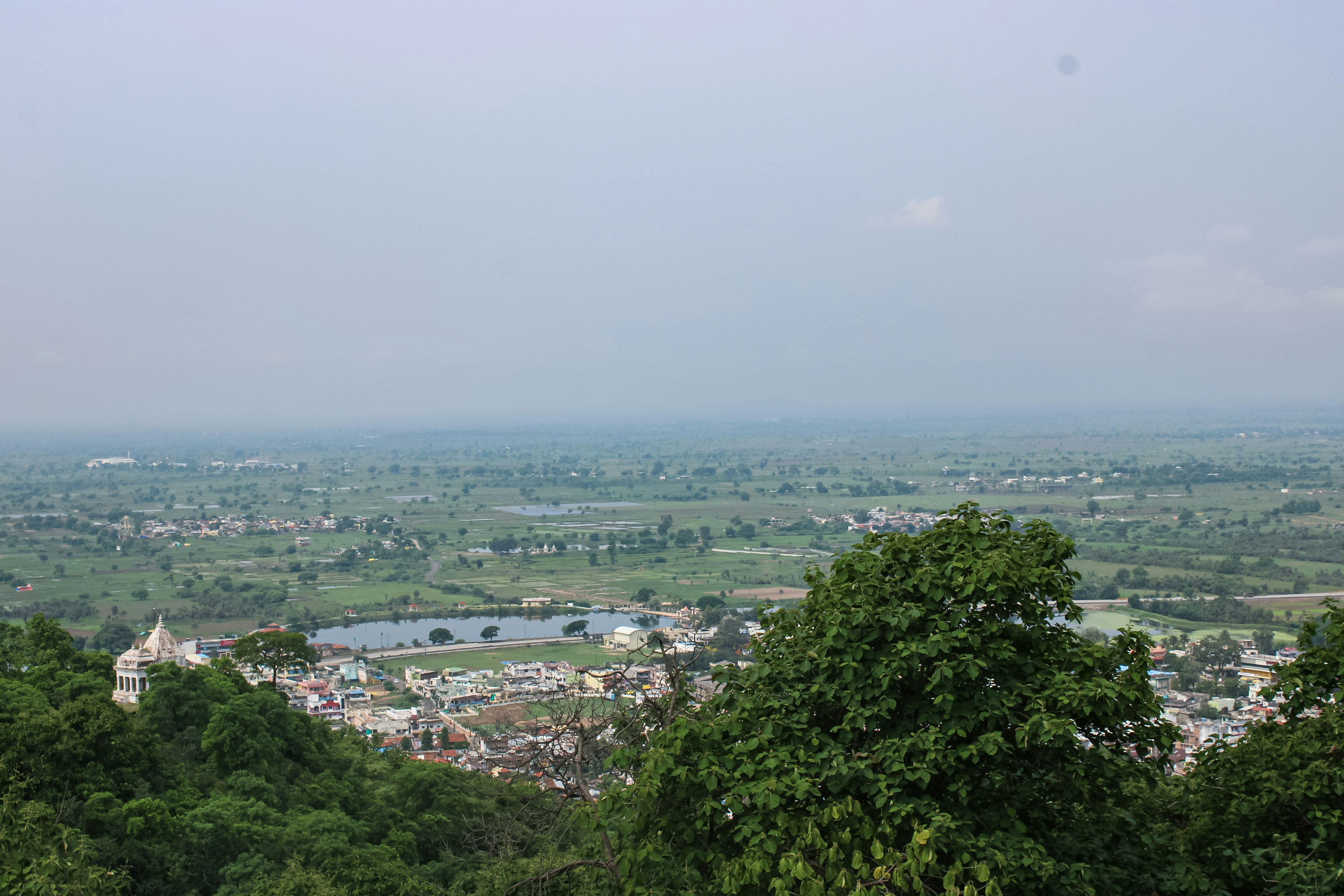 Panoramic view of Gujarat's diverse landscapes including temples, monuments and natural beauty