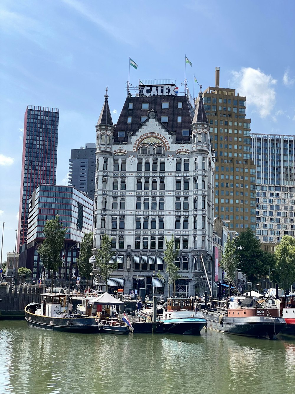 a body of water with boats and buildings around it