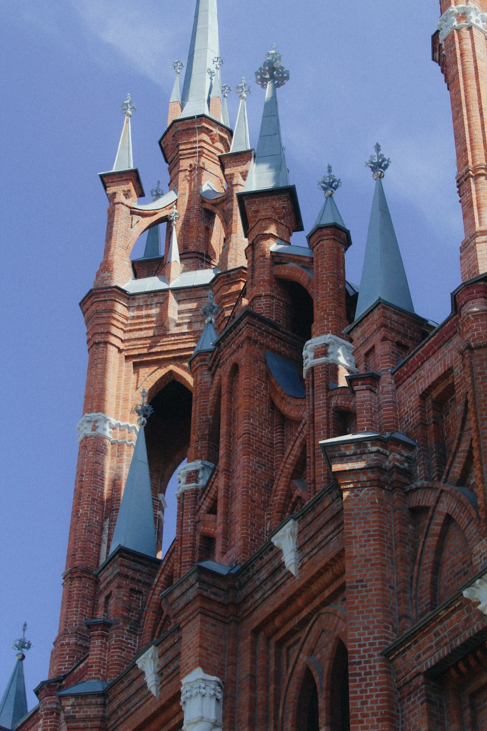 a large brick building with towers