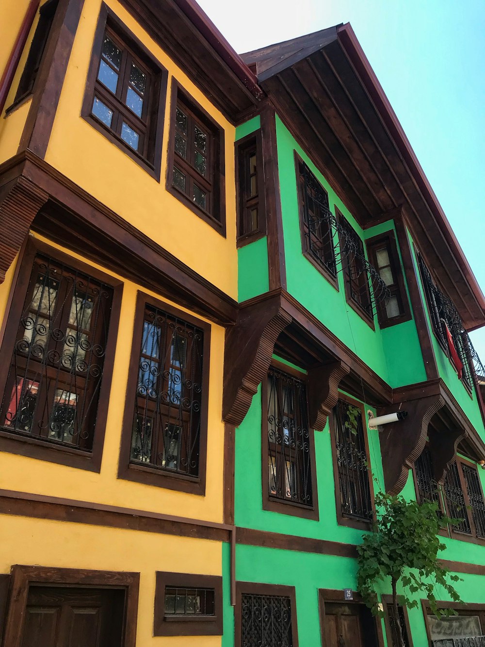 a building with green and yellow walls