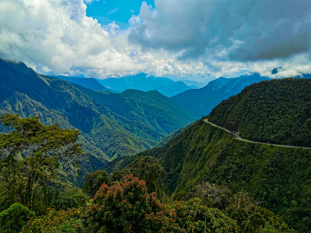 a winding road through a valley