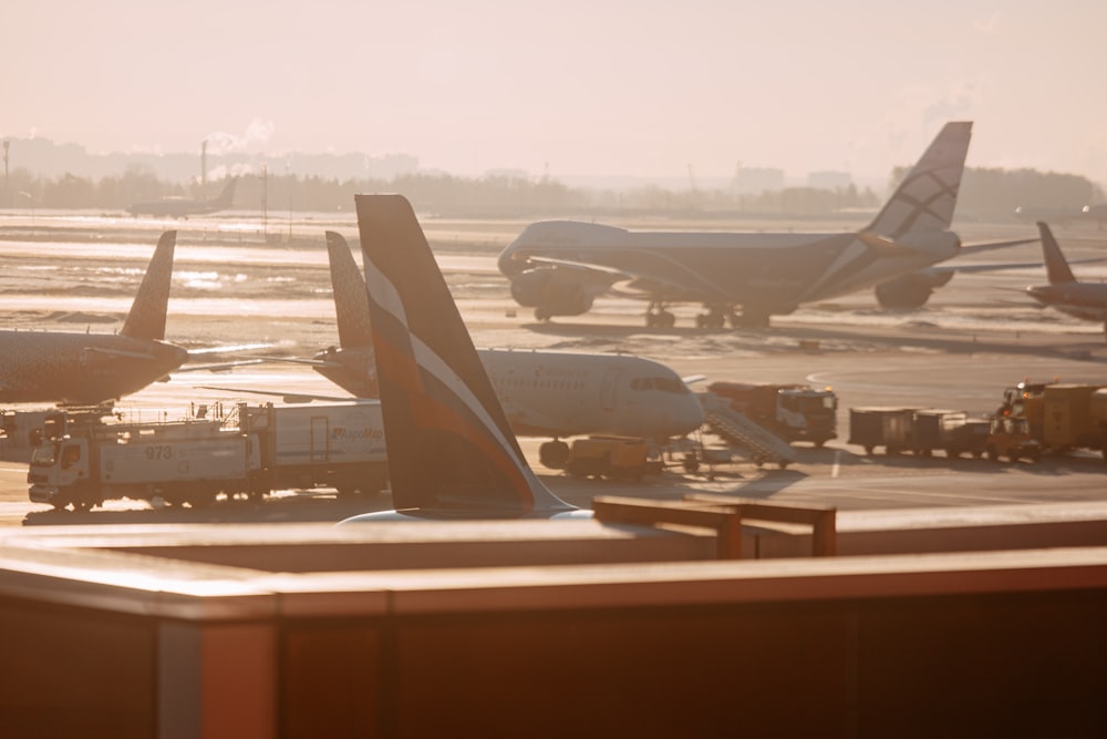 airplanes parked at an airport