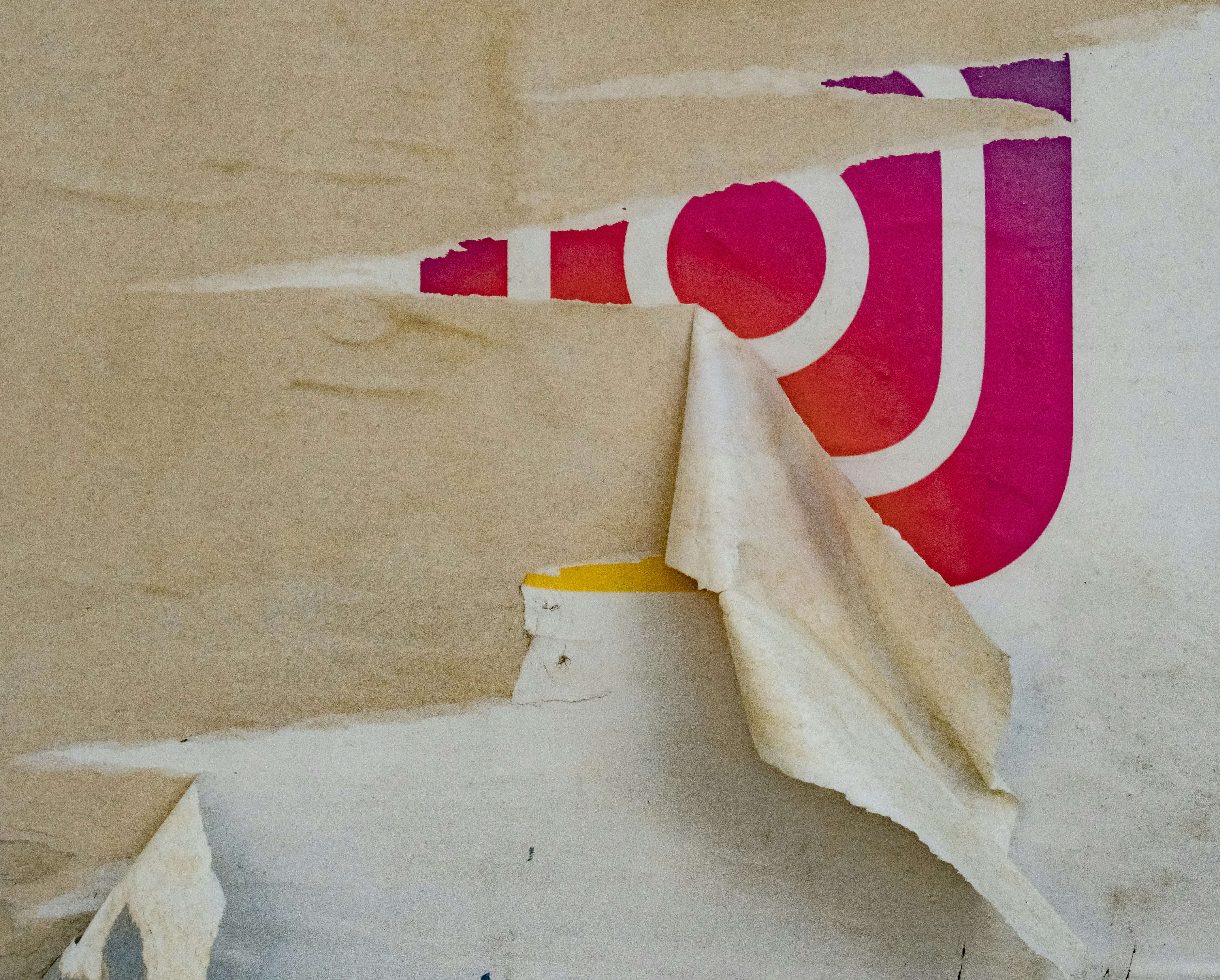 a piece of paper with a red and white logo on it