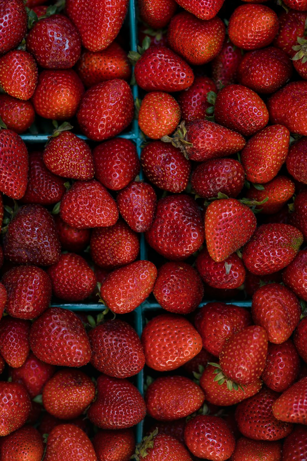 a pile of strawberries