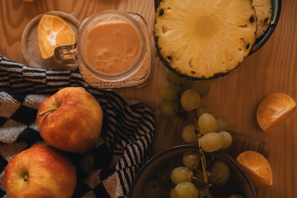 a table is filled with fruits