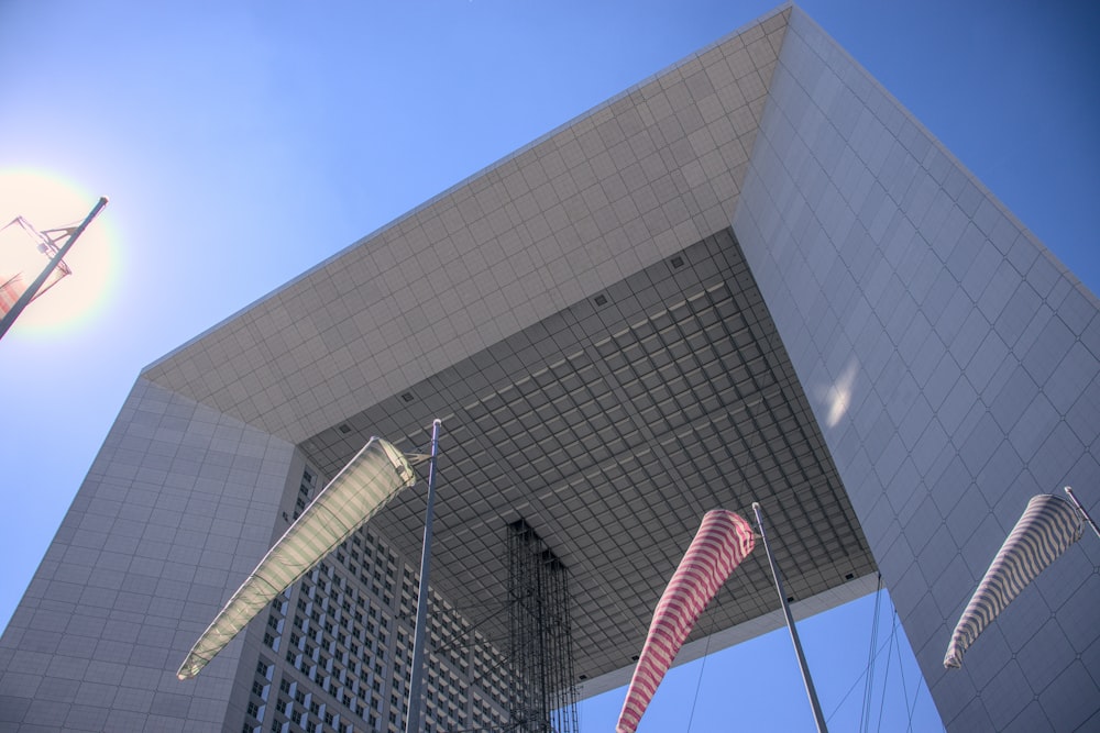 a tall building with a blue sky