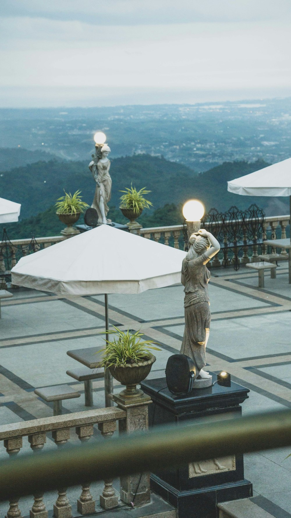 a statue on a balcony