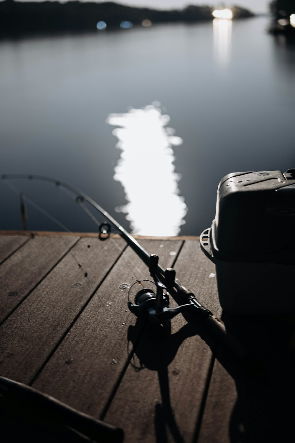 A fishing rod on a dock photo – Free Canada Image on Unsplash