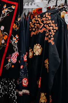 a group of black and red dresses
