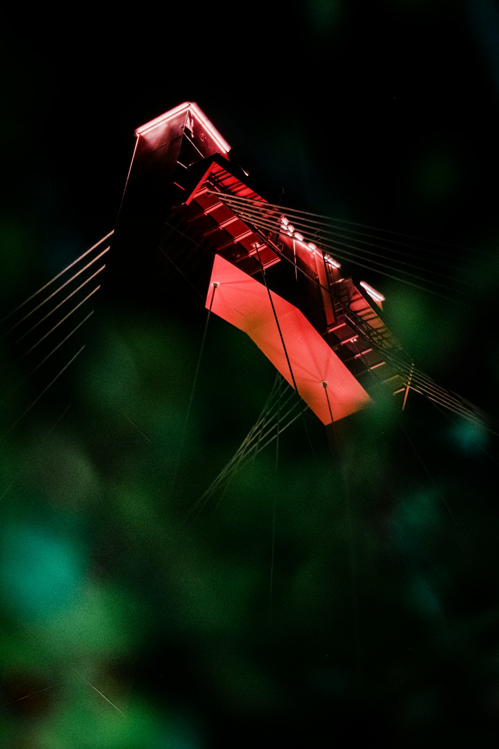 a red and white object with a black background