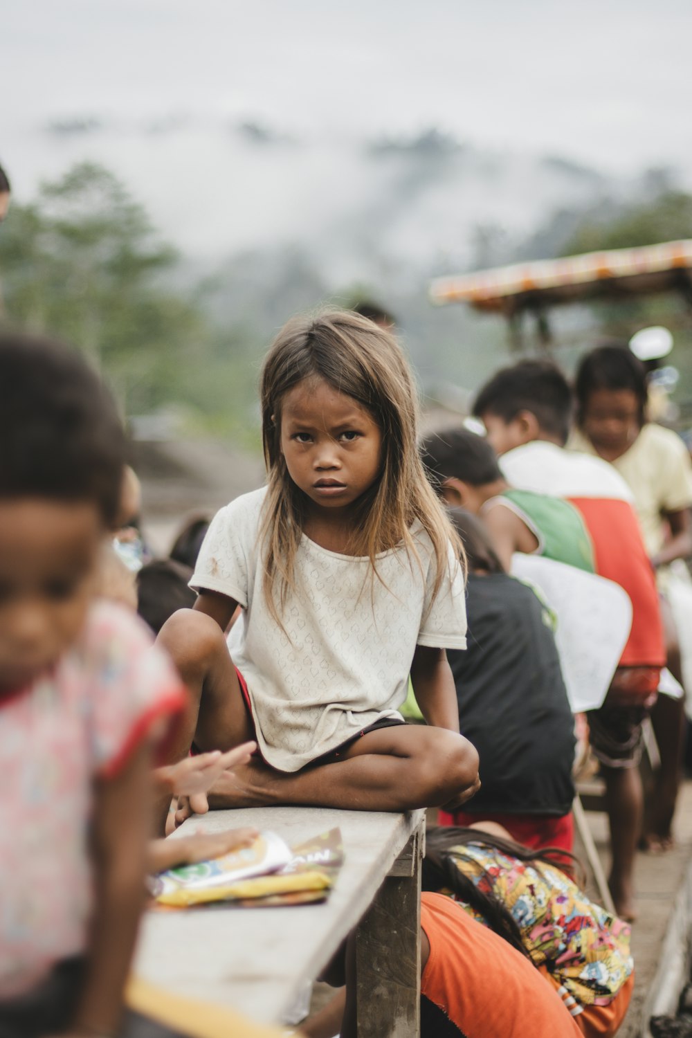 a person holding a tray of food