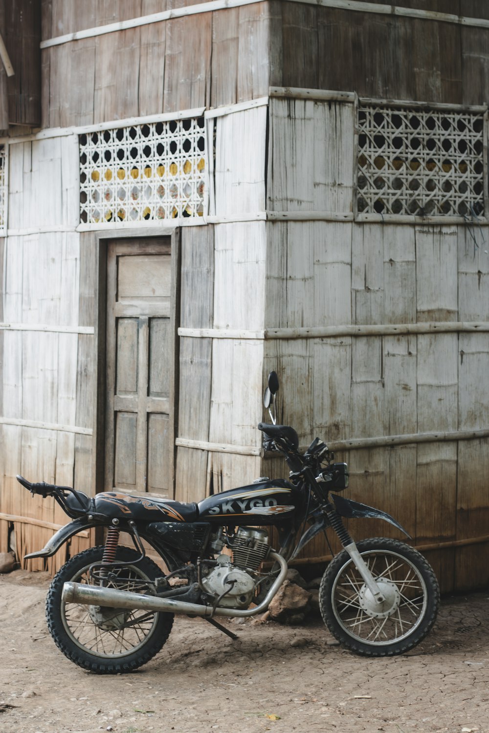 a motorcycle parked in front of a building