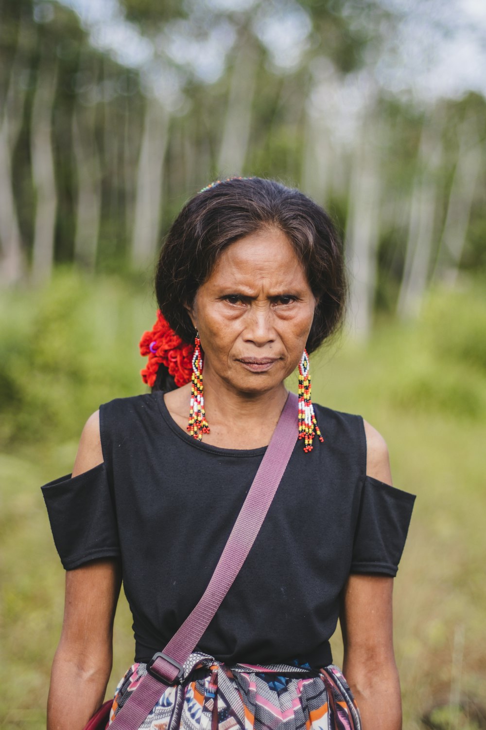 a person with a flower necklace