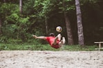 a man catching a frisbee