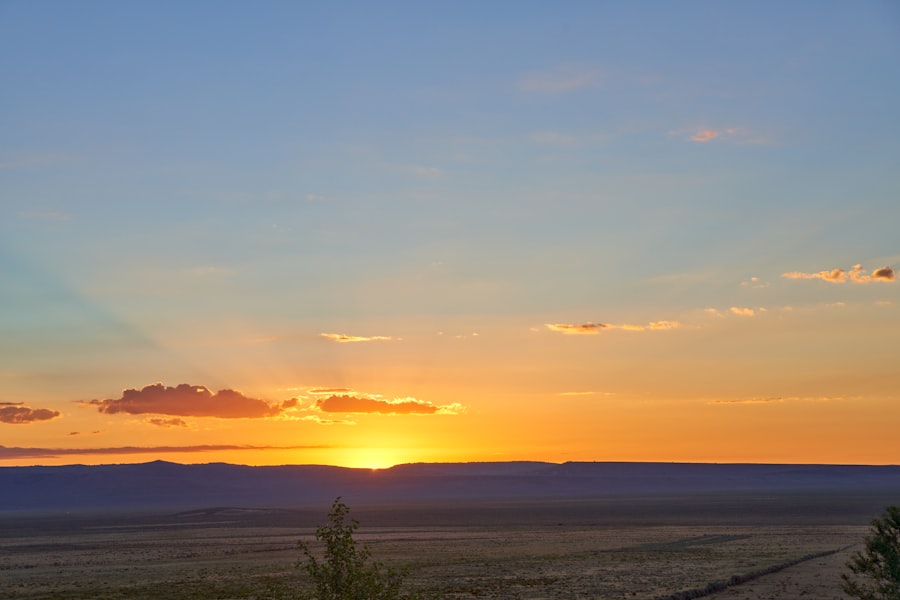 a sunset over a large body of water