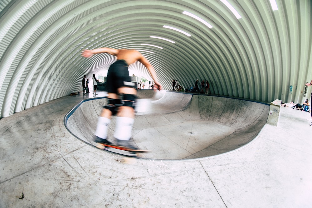 a person skating on a ramp