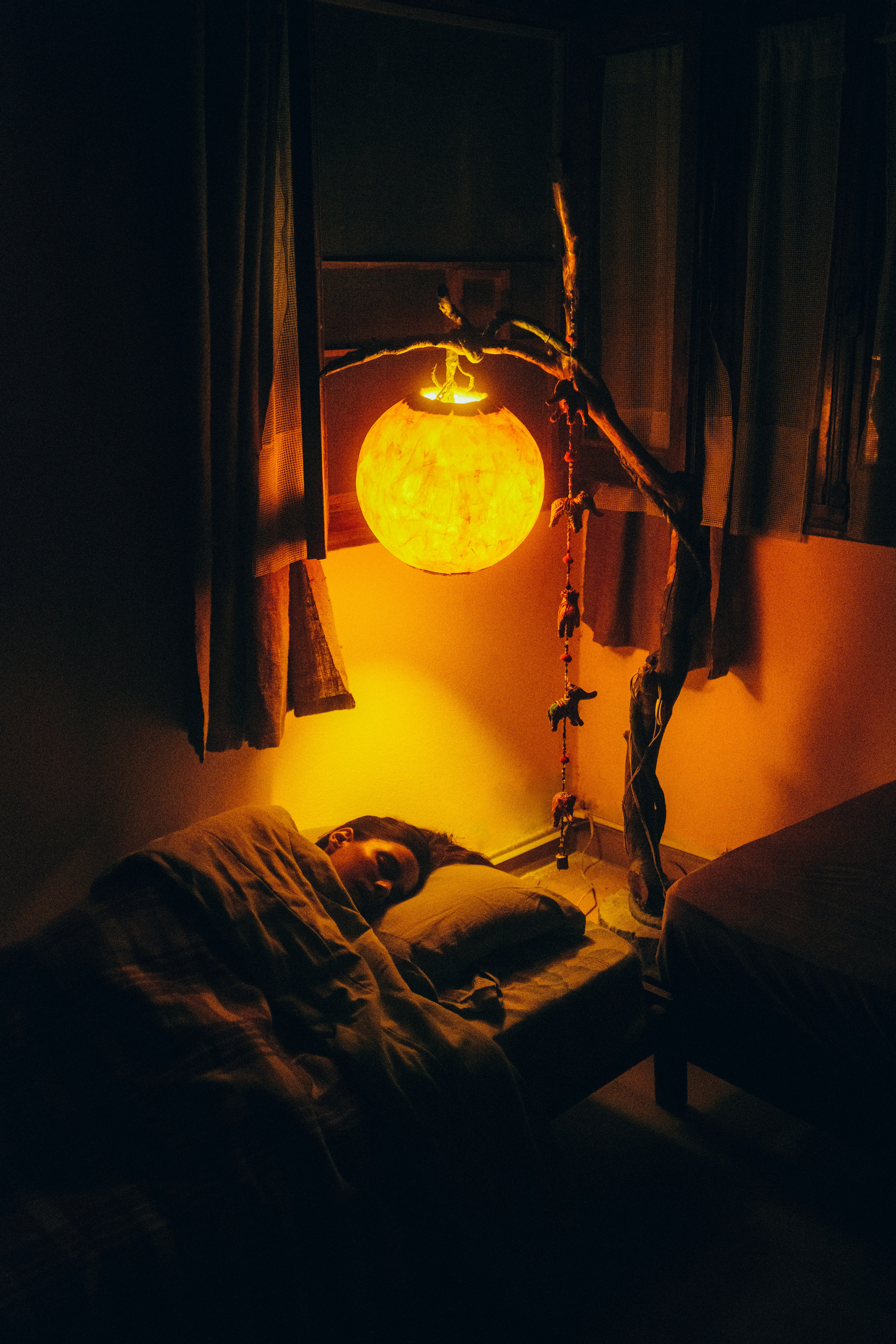 a person sleeping on a bed