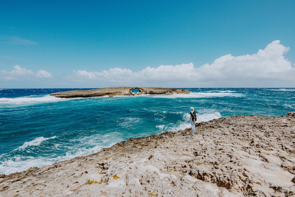 a person standing on a beach