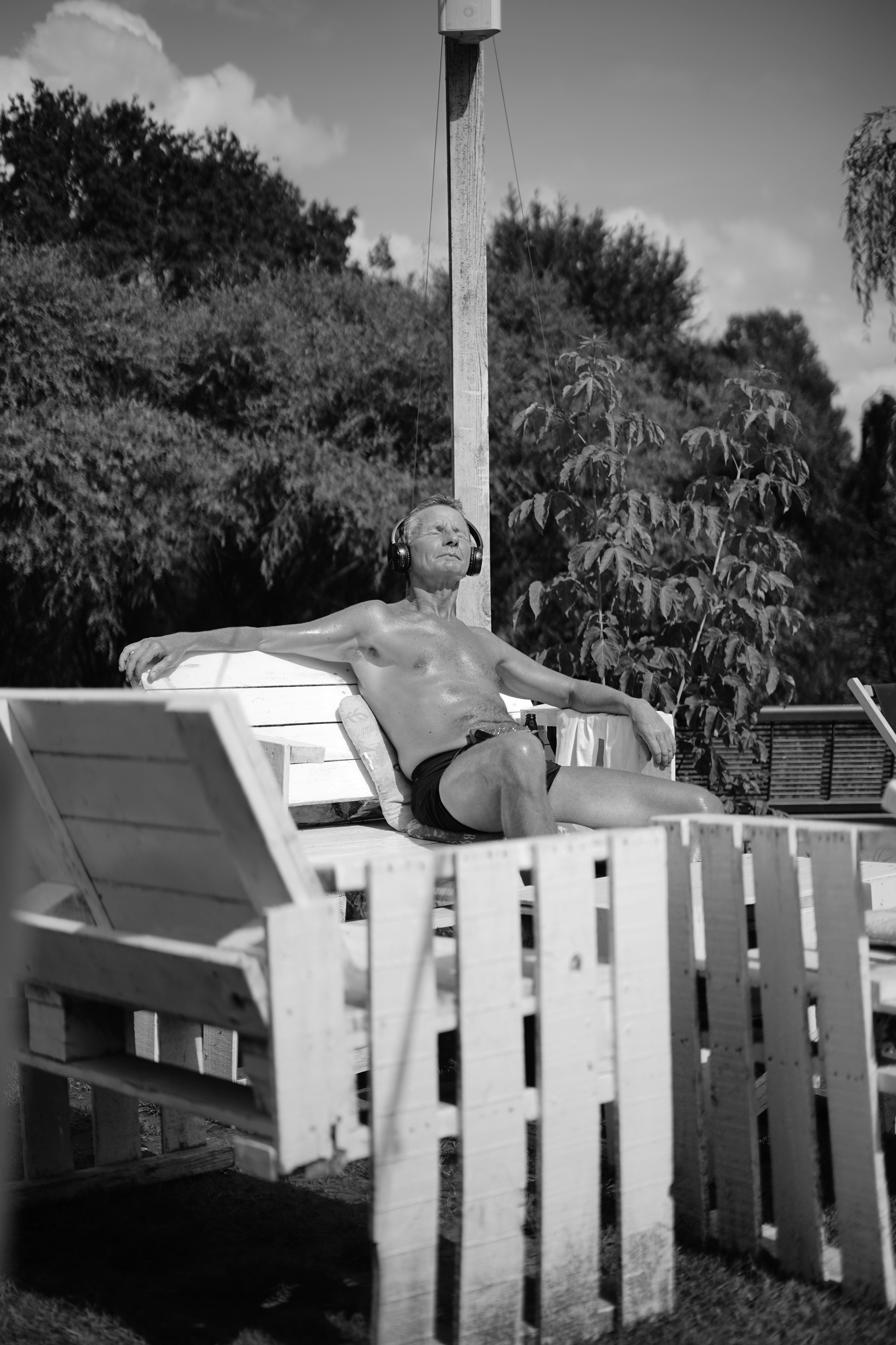 a person sitting on a fence