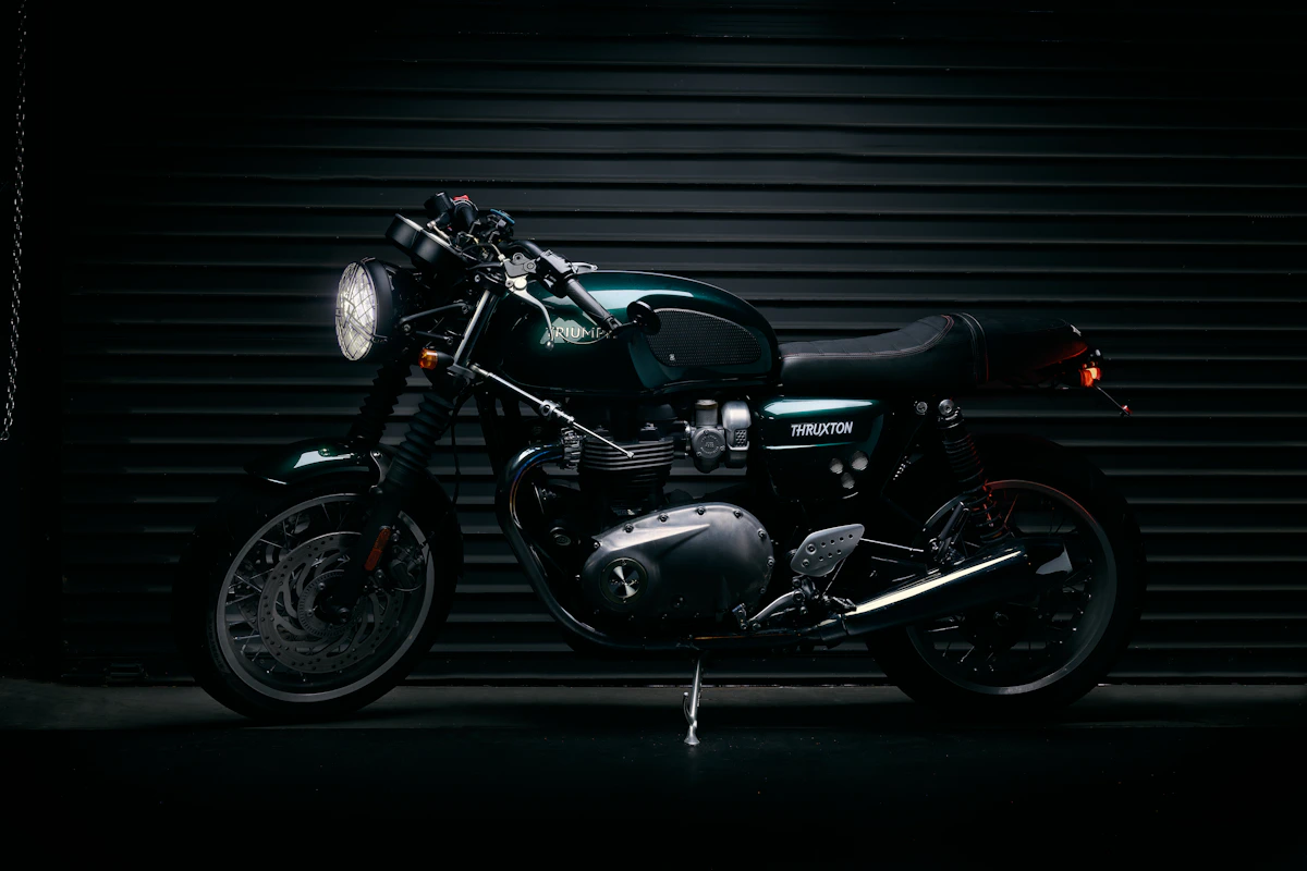 Motorcycle standing in a shadowy garage