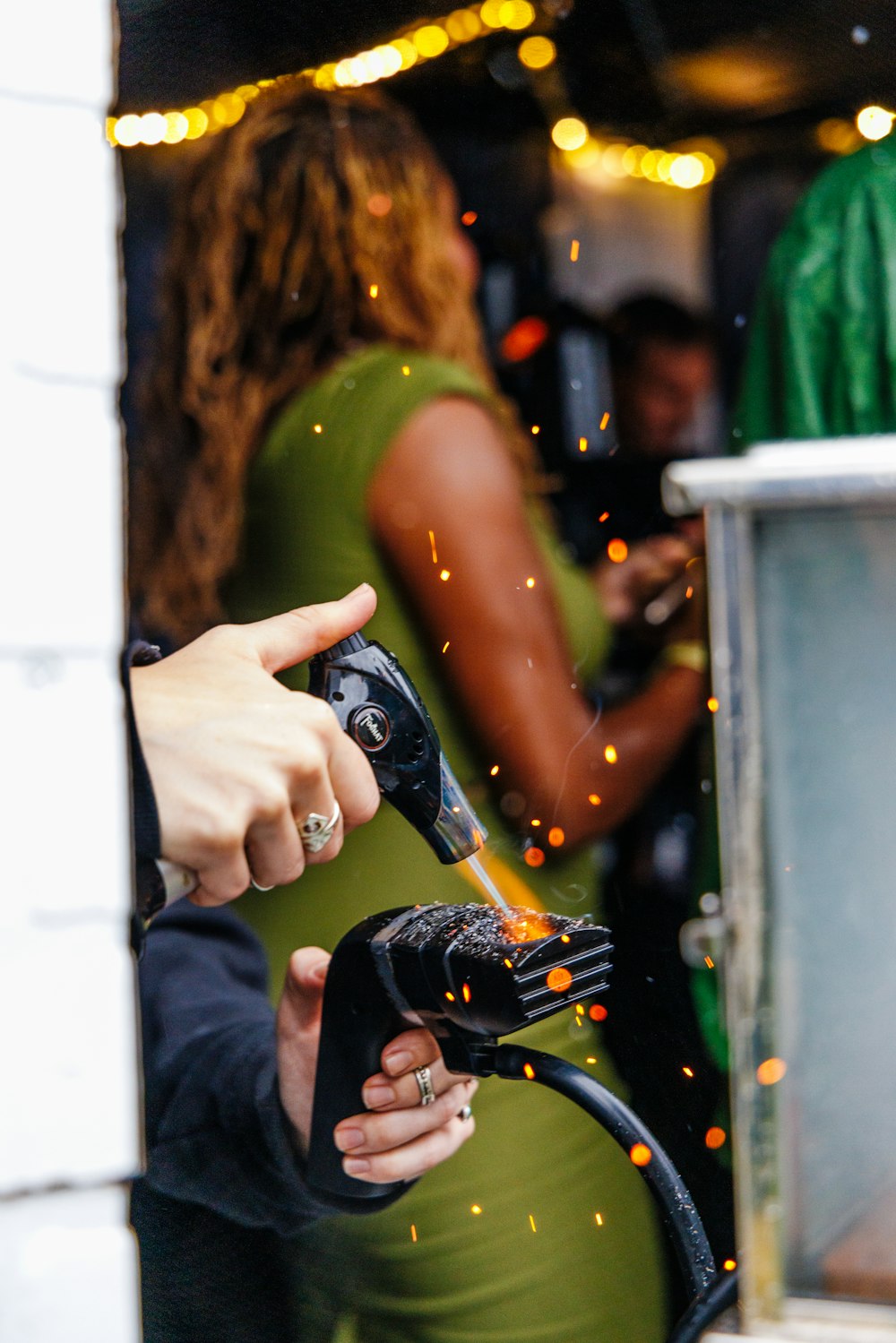 a person holding a bottle