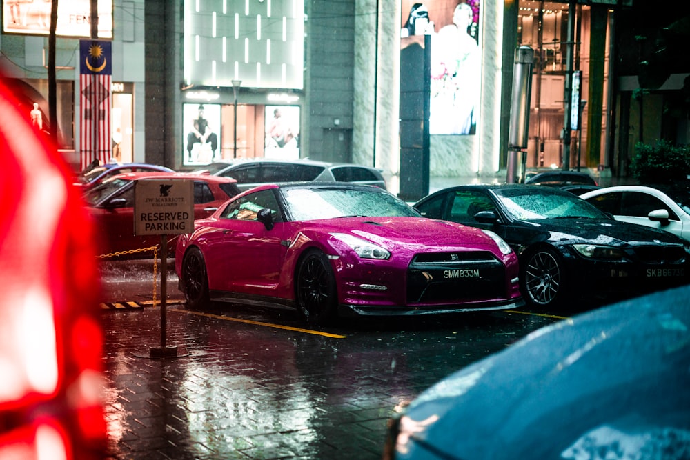 a group of cars parked on the side of a street