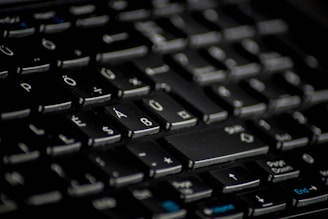 Icon of a keyboard with highlighted shortcut keys in blue.