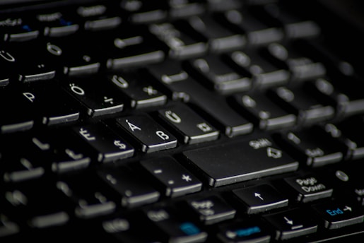 Icon of a keyboard with highlighted shortcut keys in blue.