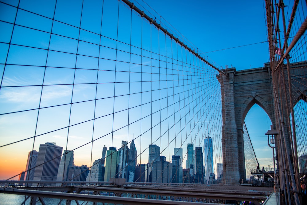 a bridge with a city in the background