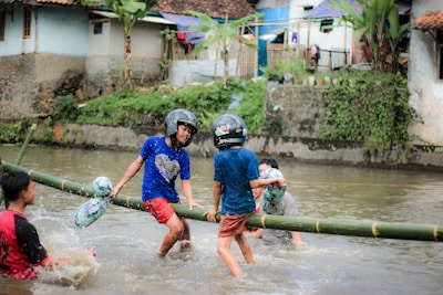 Kelly Wiglesworth and her son Rio interacting with children in a remote village.