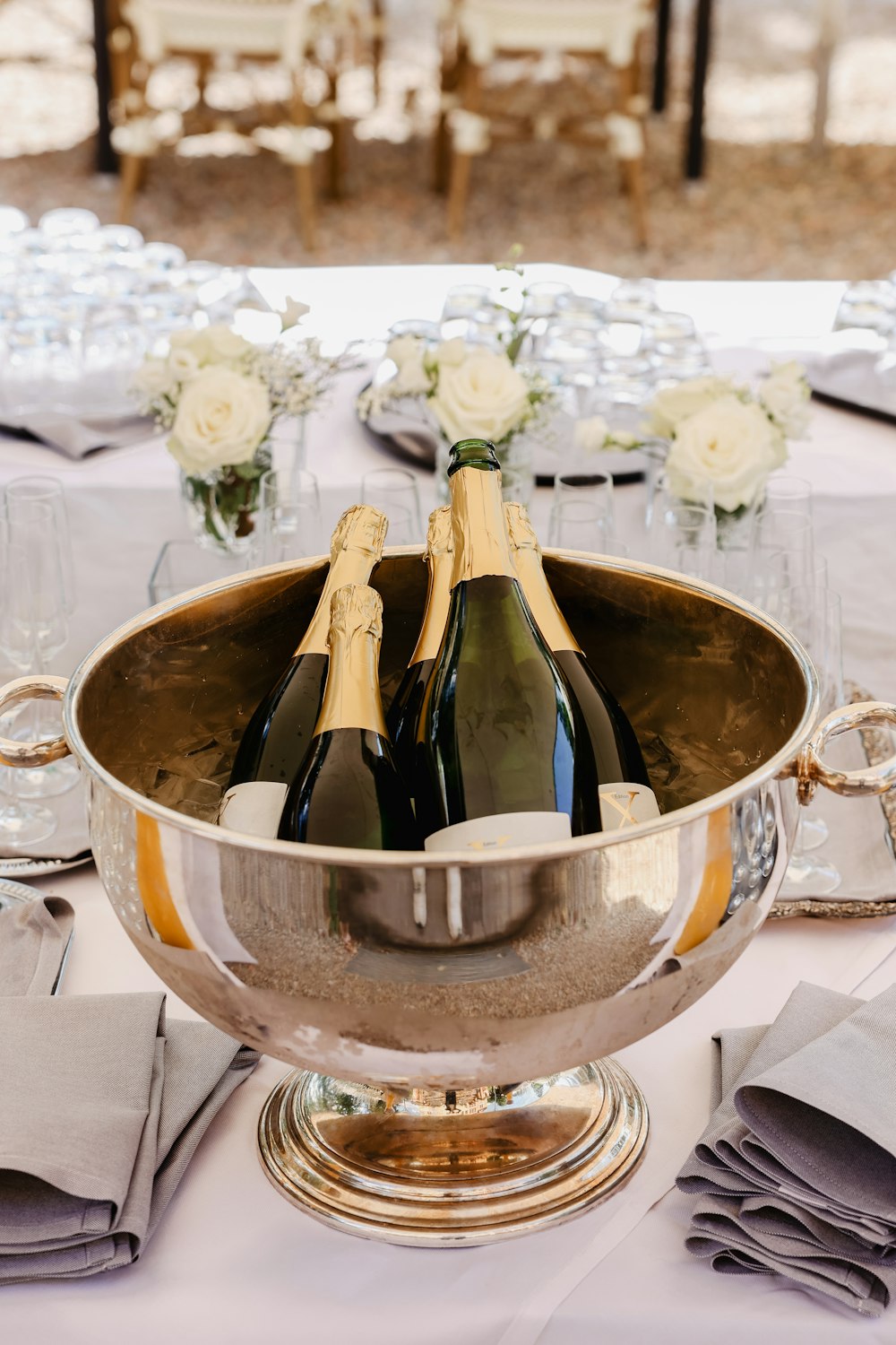 a bowl of champagne bottles