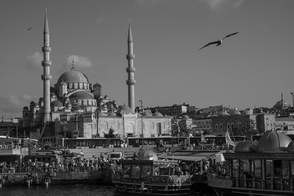 a city with a domed building and a body of water