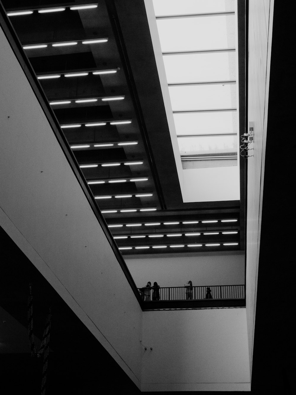 a group of people walking down a flight of stairs